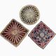 3 woven straw trivets