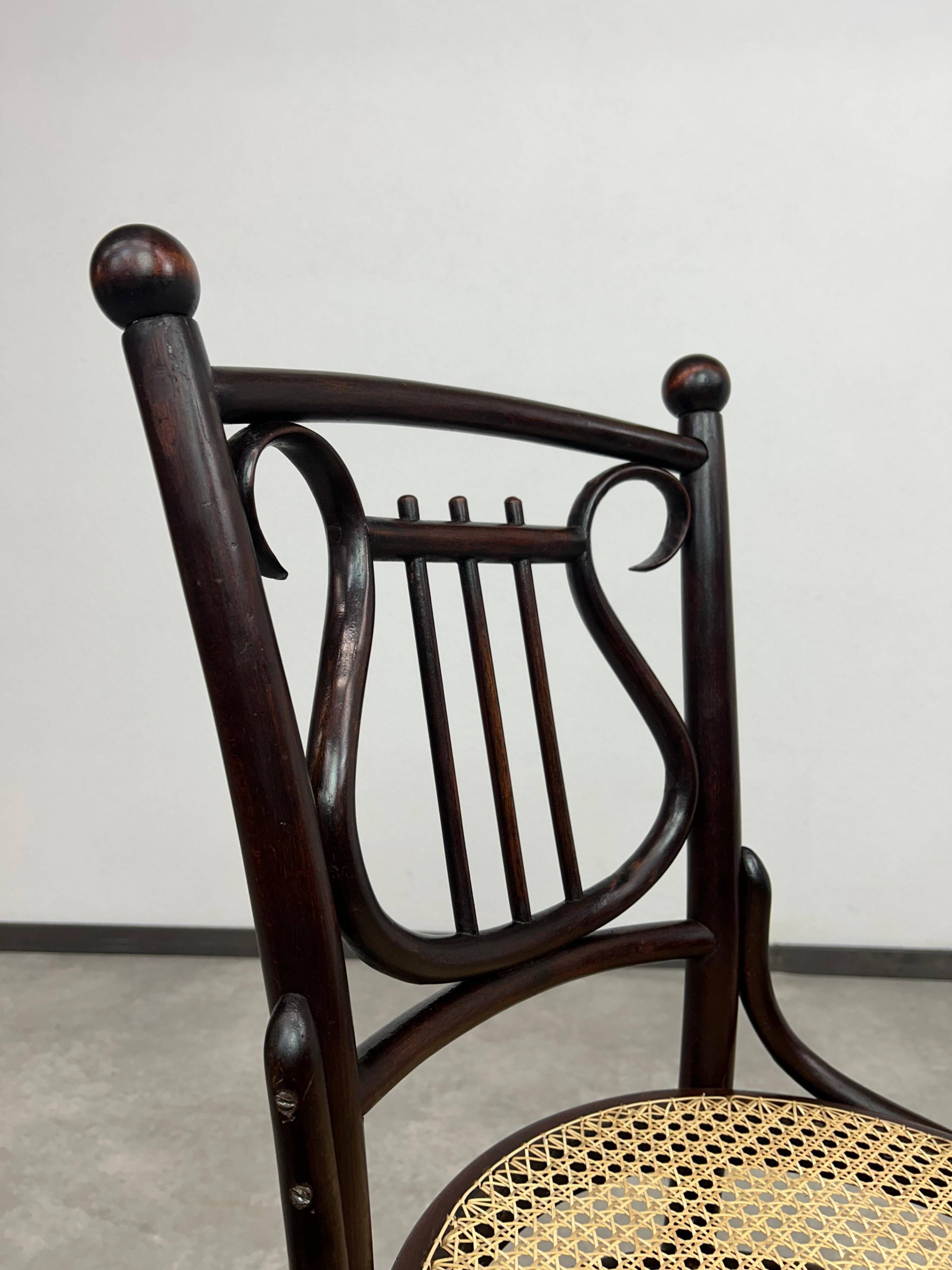 Curved wooden chair attributed to Thonet.