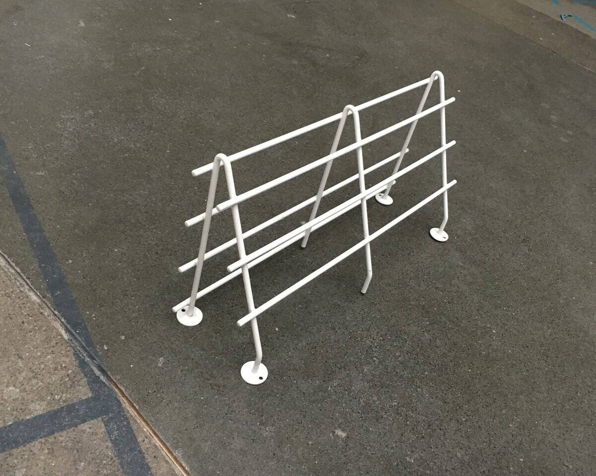 Mid-century modern minimalist metal coat rack from the 1960s.