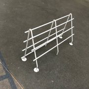 Mid-century modern minimalist metal coat rack from the 1960s.