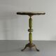 Mid-century side table in green marble with a brass base, 1960s, Italy.