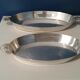 2 oval dishes . Silver metal
