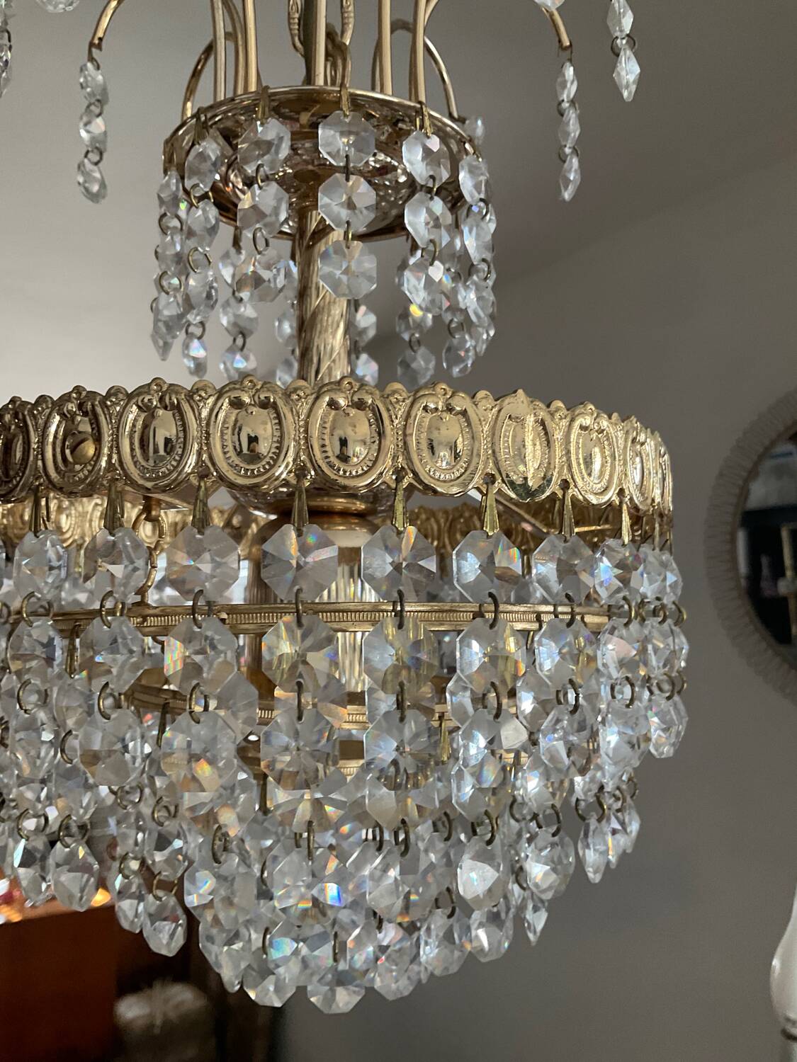 Cascade chandelier with crystal and brass tassels