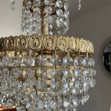 Cascade chandelier with crystal and brass tassels