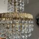 Cascade chandelier with crystal and brass tassels