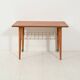 Table basse scandinave en teck avec étagère en laiton