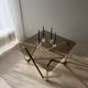 Coffee table with smoked glass and curved metal base