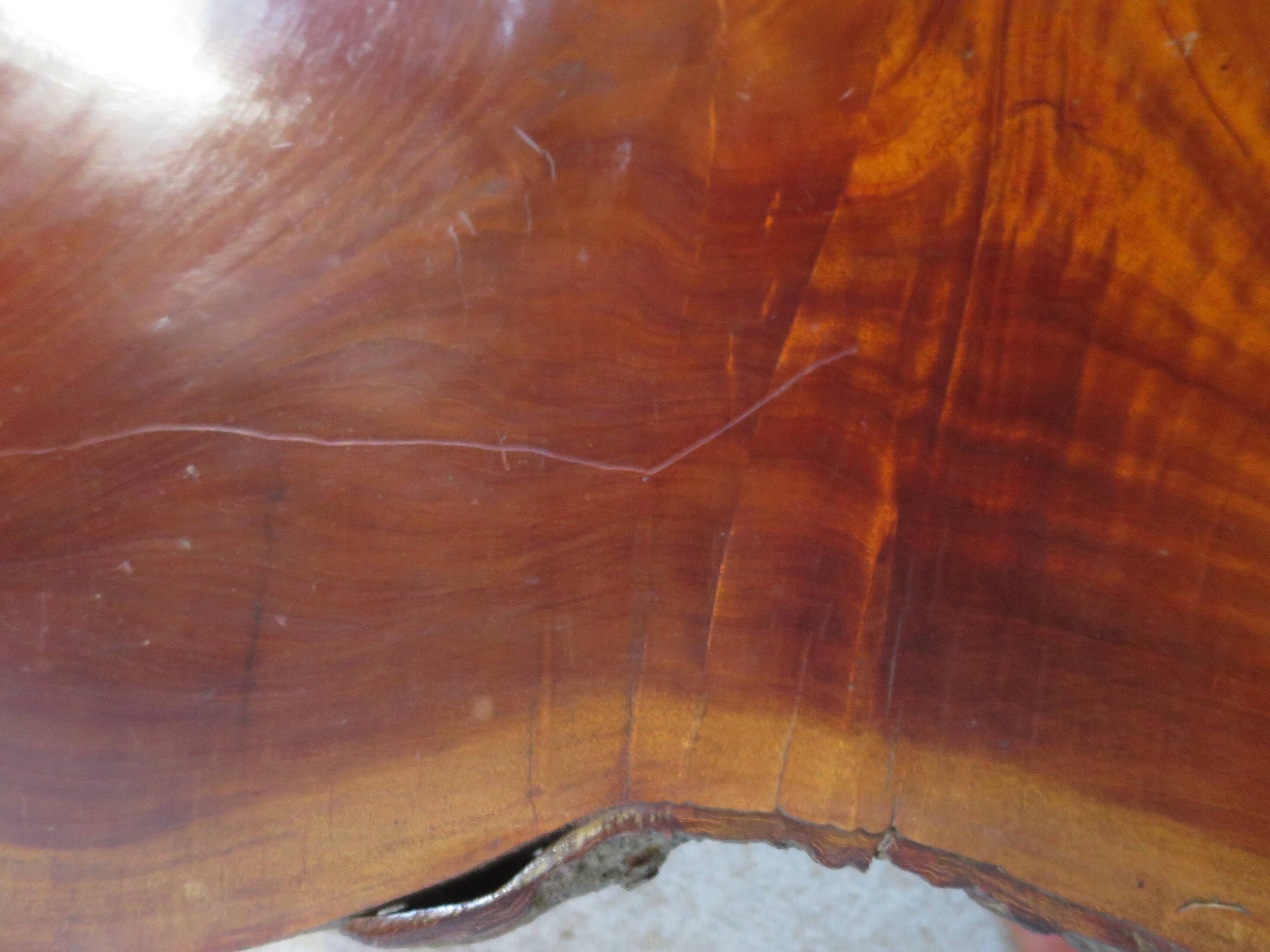 Tripod coffee table - solid okoumé wood - organic shape - brutalist style