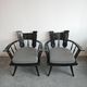 Pair of antique hand-carved armchairs in black lacquer from the 1920s.