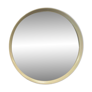 Beige vintage round mirror in a space style / wall mirror