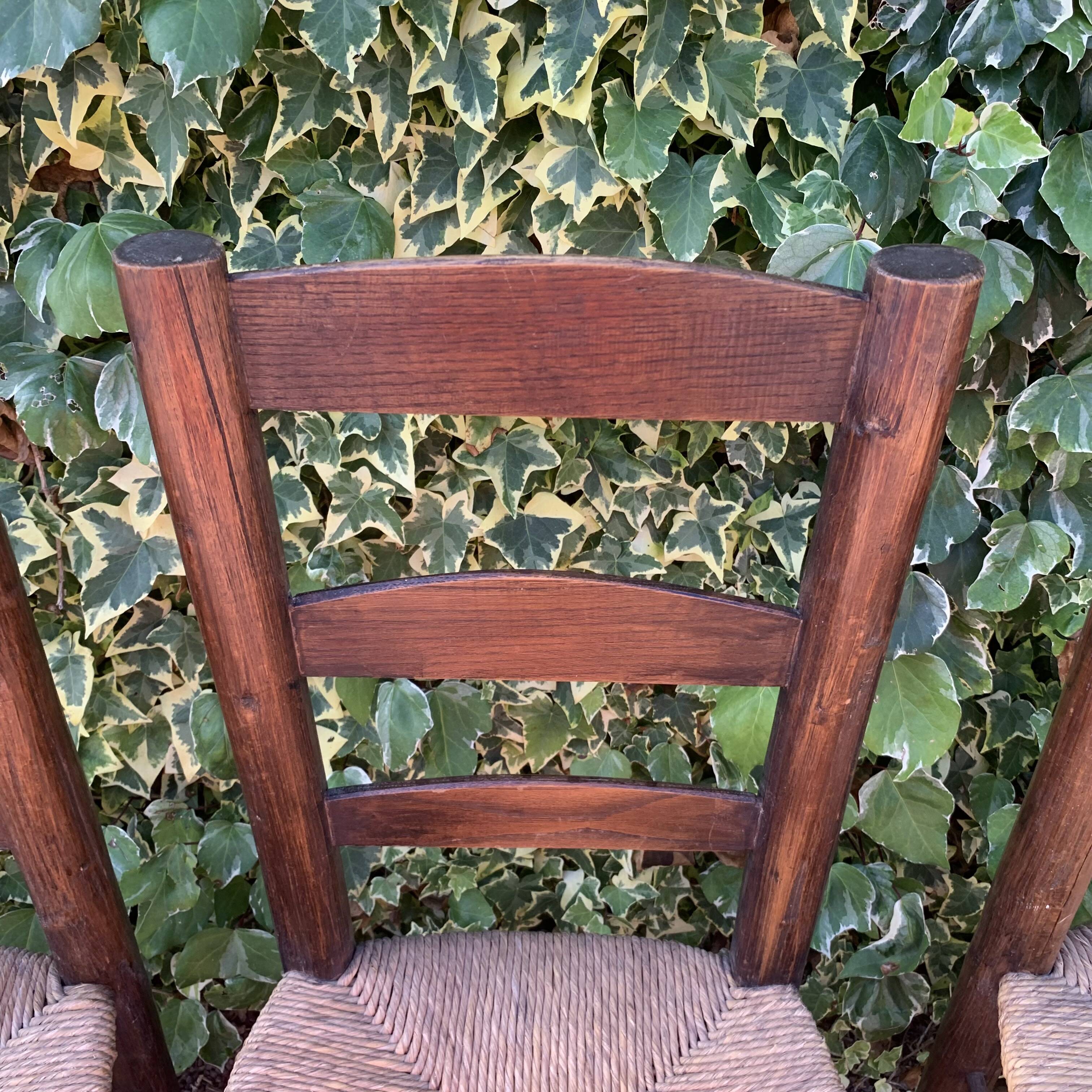 Set of 4 handcrafted rush chairs in solid oak.