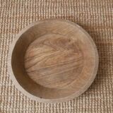 Raw wooden dish carved in the mass ethnic African art handmade artisanal manufacturing
