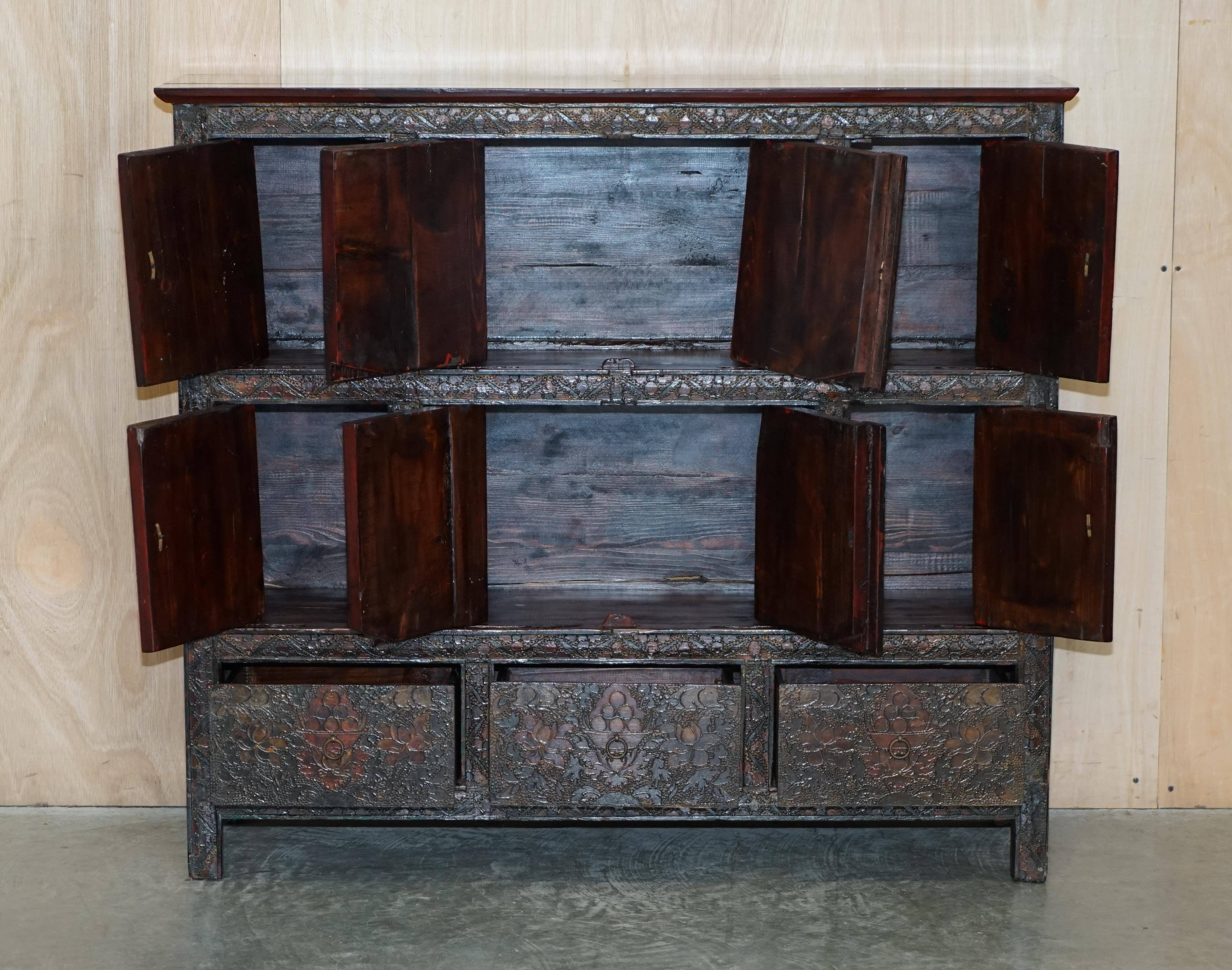 Antique polychrome Tibetan altar cabinet with deer and flowers.