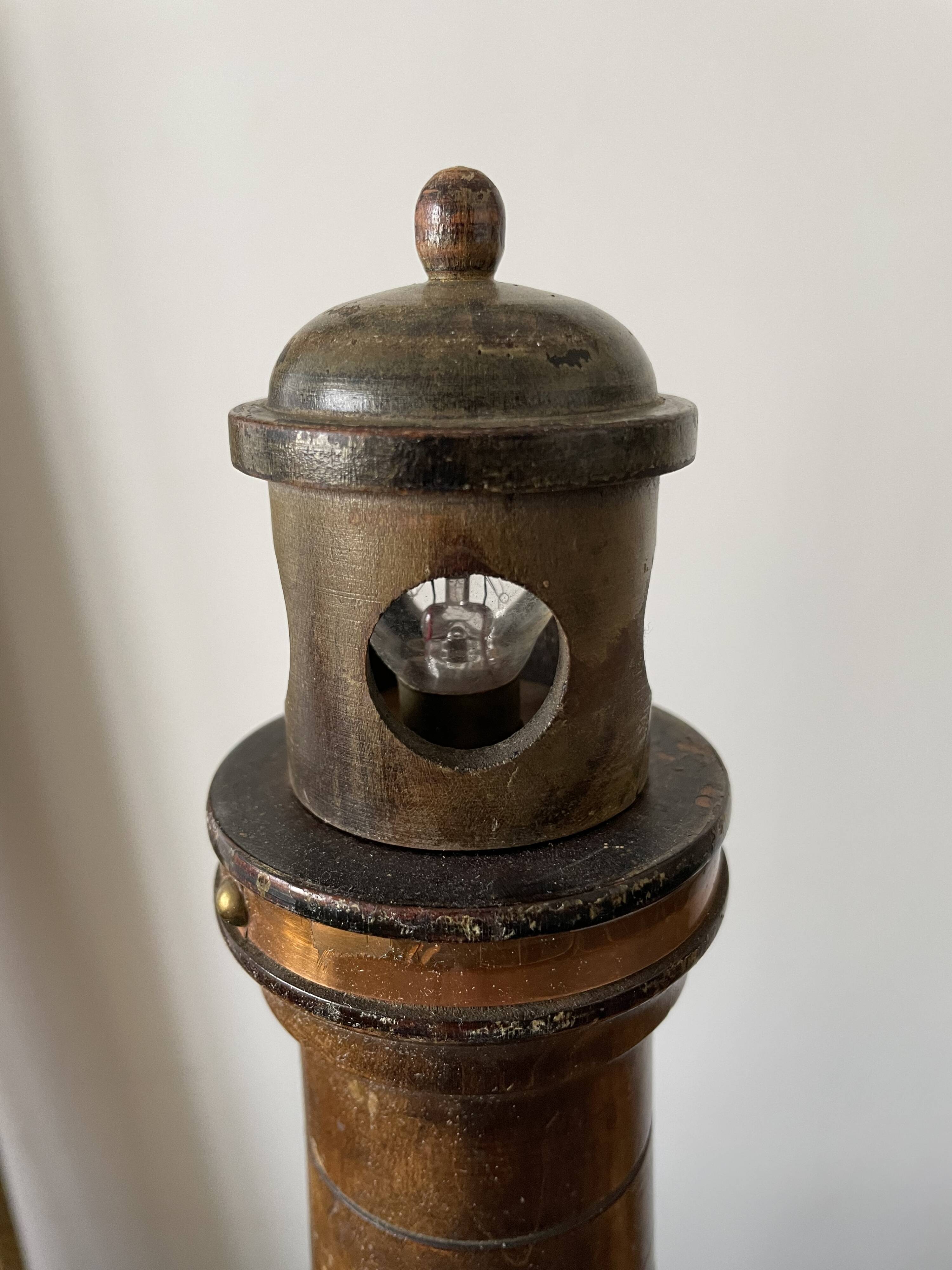 Souvenir lighthouse lamp from Calais in wood