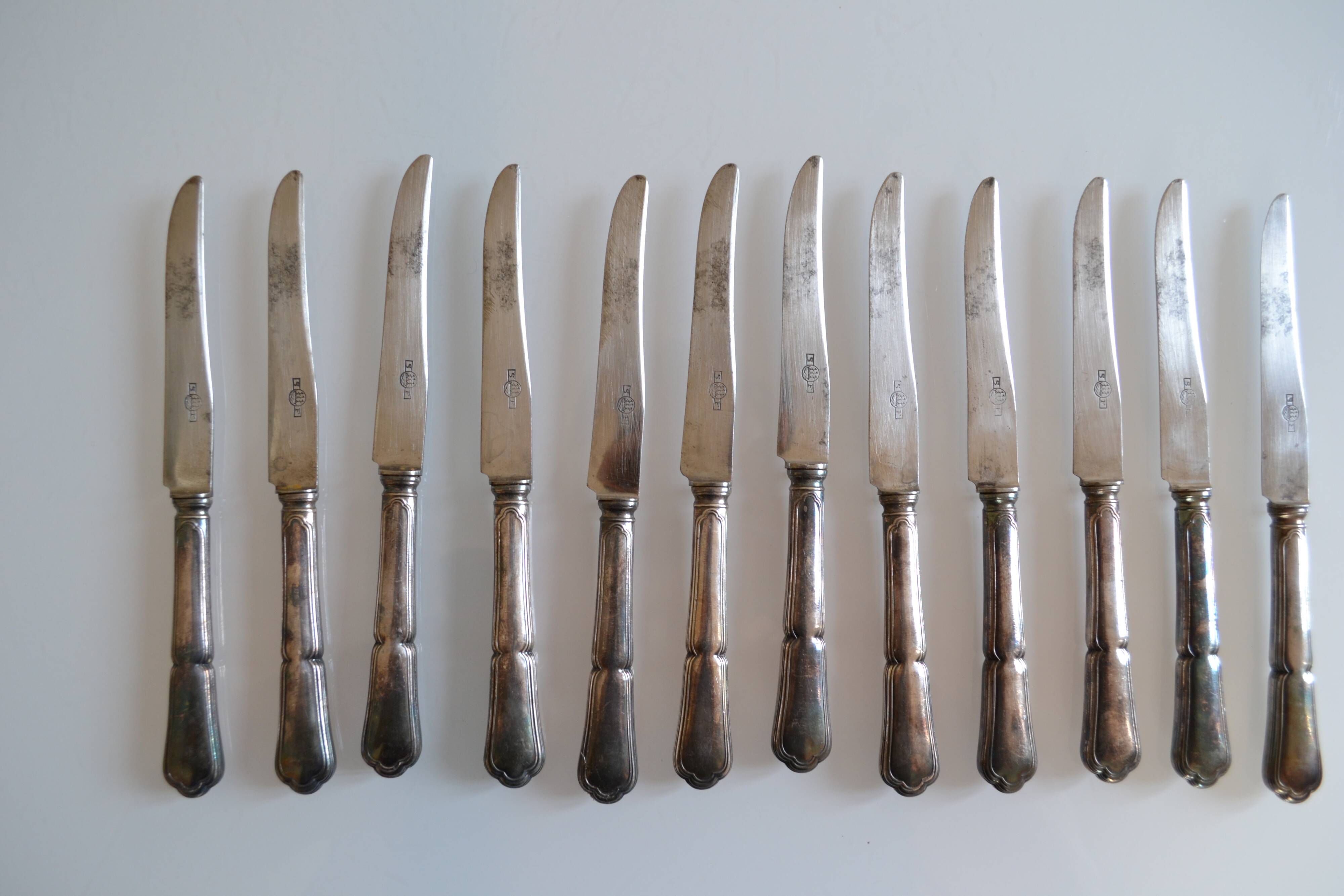 12 silver metal dessert or cheese knives
