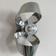 Aluminum knot wall lamp