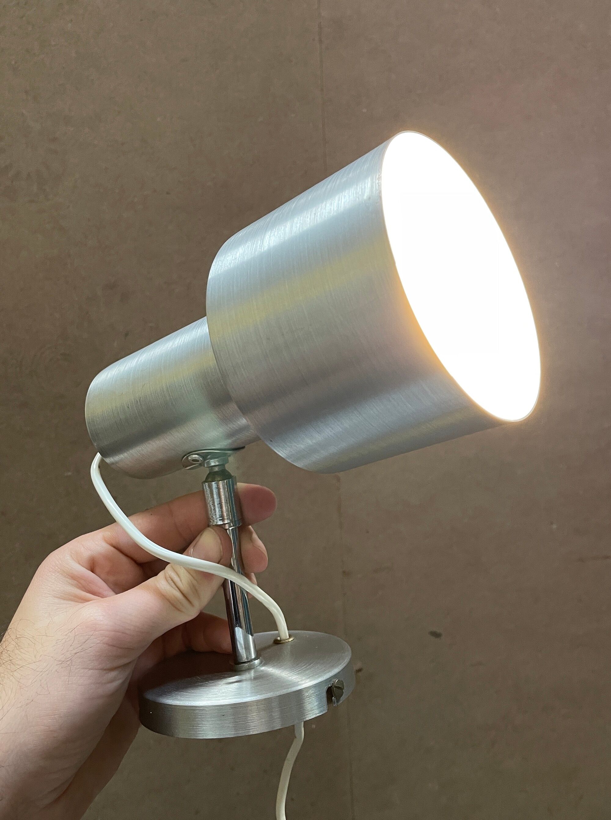 Pair of swivel brushed metal sconces