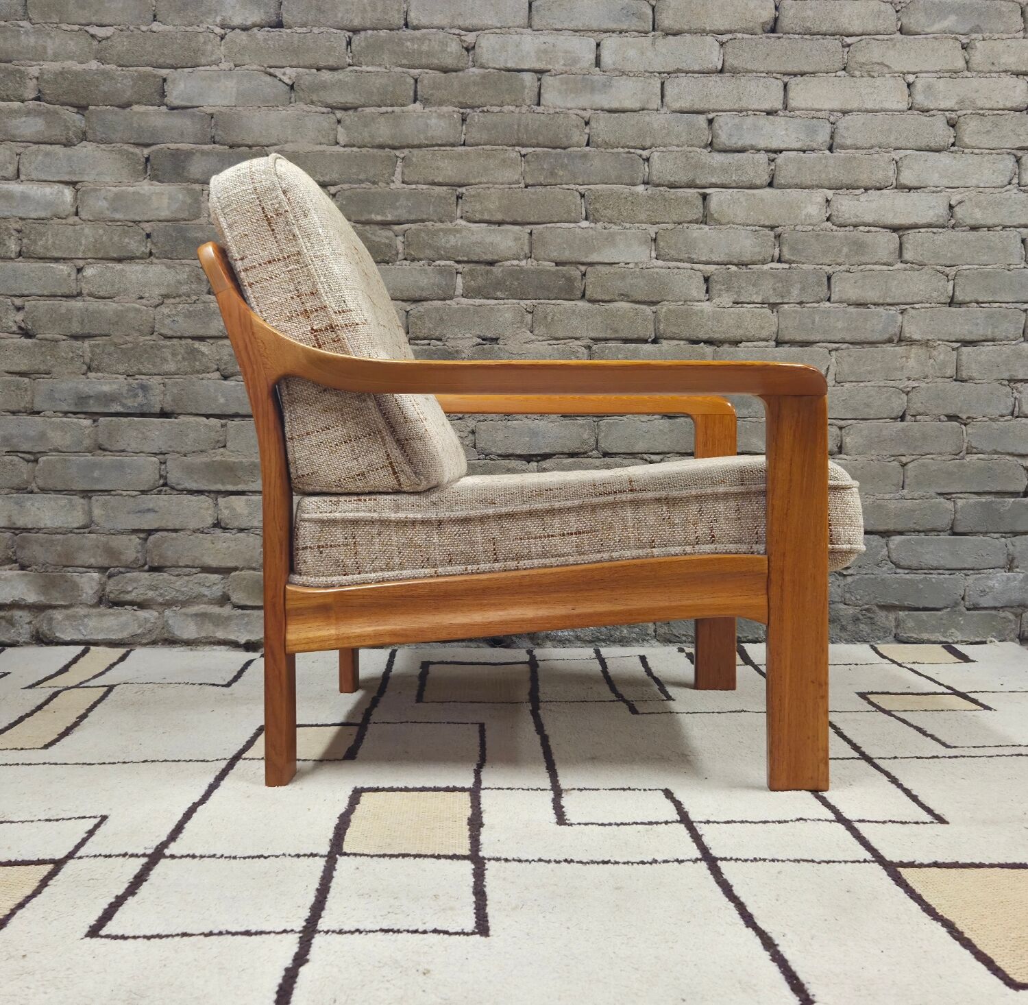 Danish canapé and its 1970s teak armchair