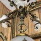 19th century brass and bronze chandelier, Napoleon III, illuminated by 6 tulips and a central globe