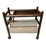 Vintage rattan magazine rack on wheels