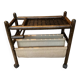 Vintage rattan magazine rack on wheels