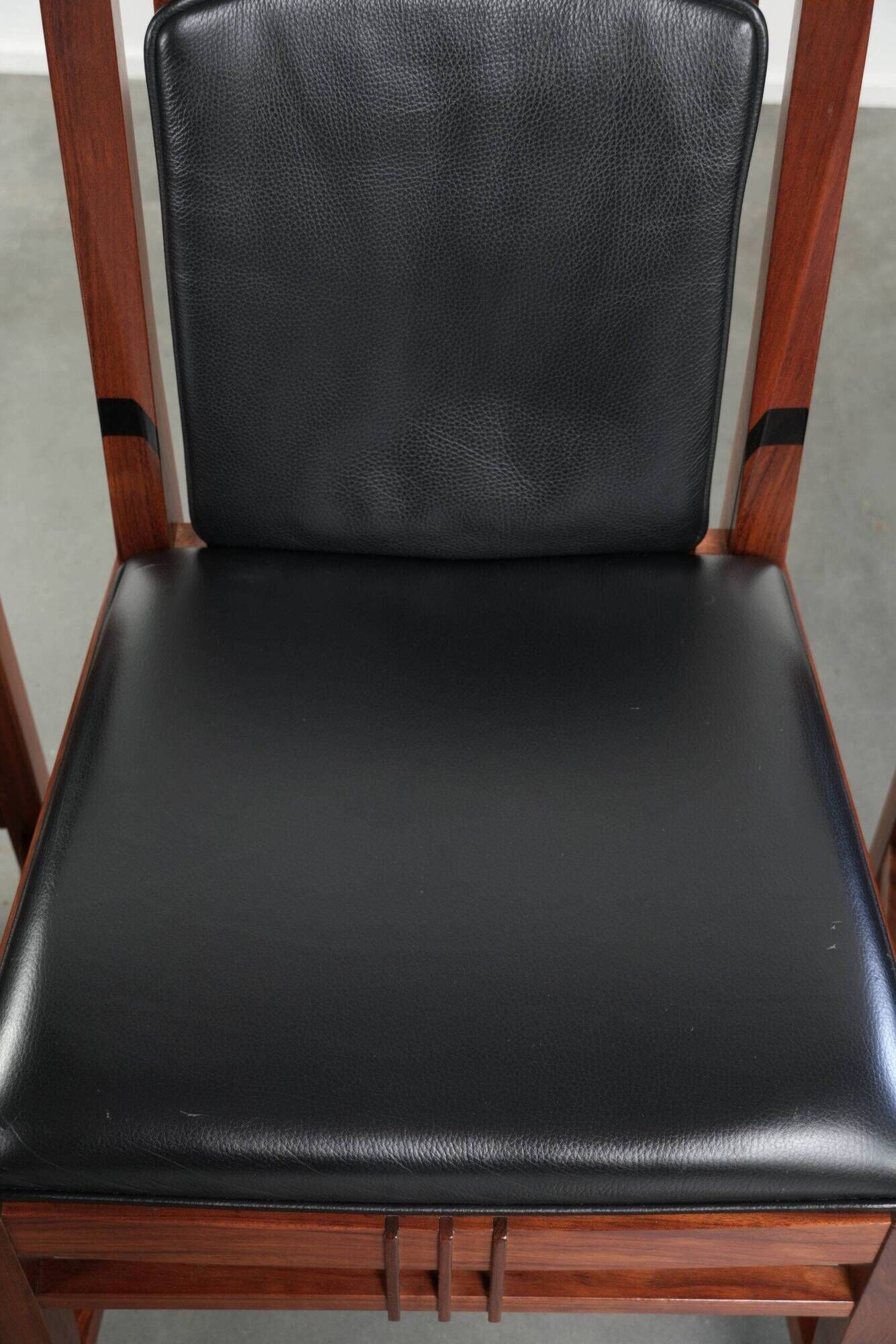 Elegant set of four black cowhide and wooden Art Deco dining chairs