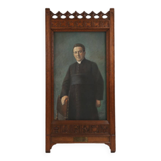 Richly decorated neo-gothic frame with colored photo of a school director, Belgium, 1925