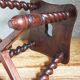 Antique stool in turned and carved solid wood