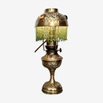 Brass lamp "La Parisienne" at the end of the 19th century.