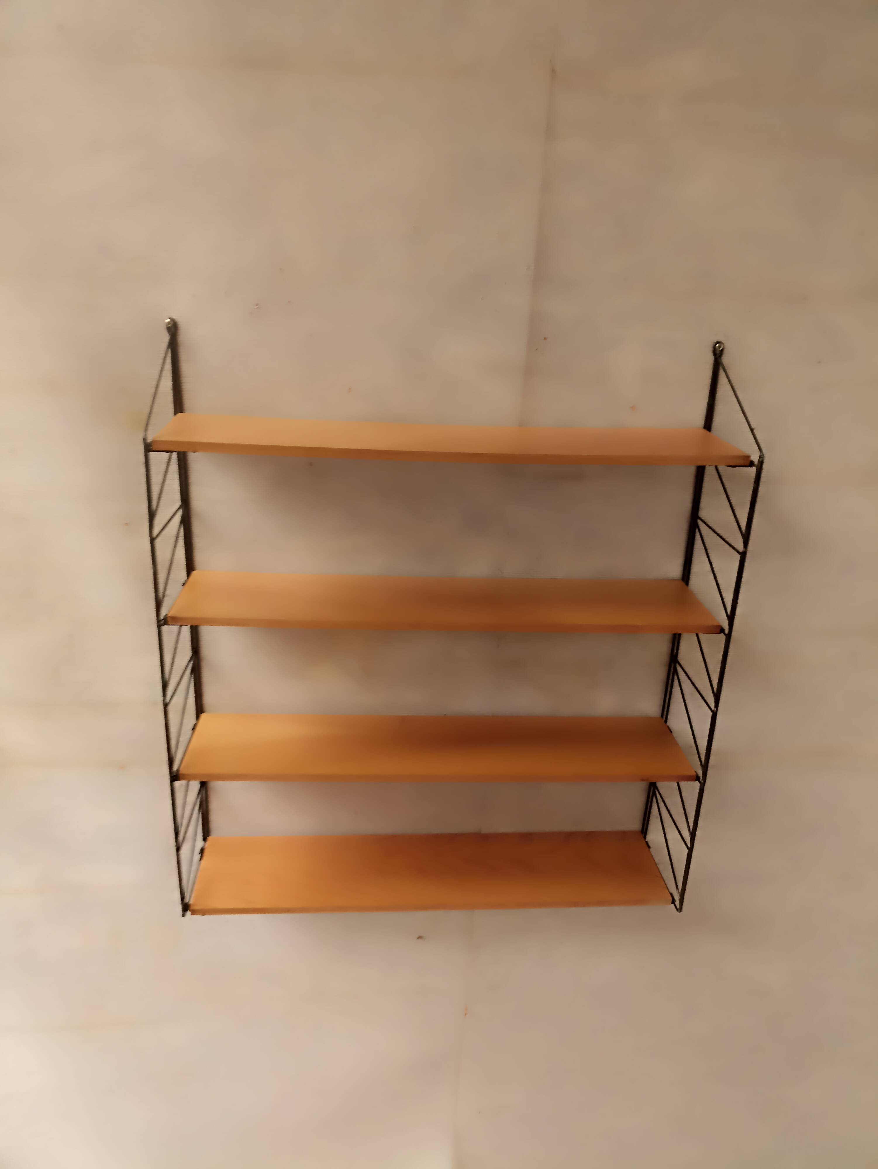 String style wall shelf