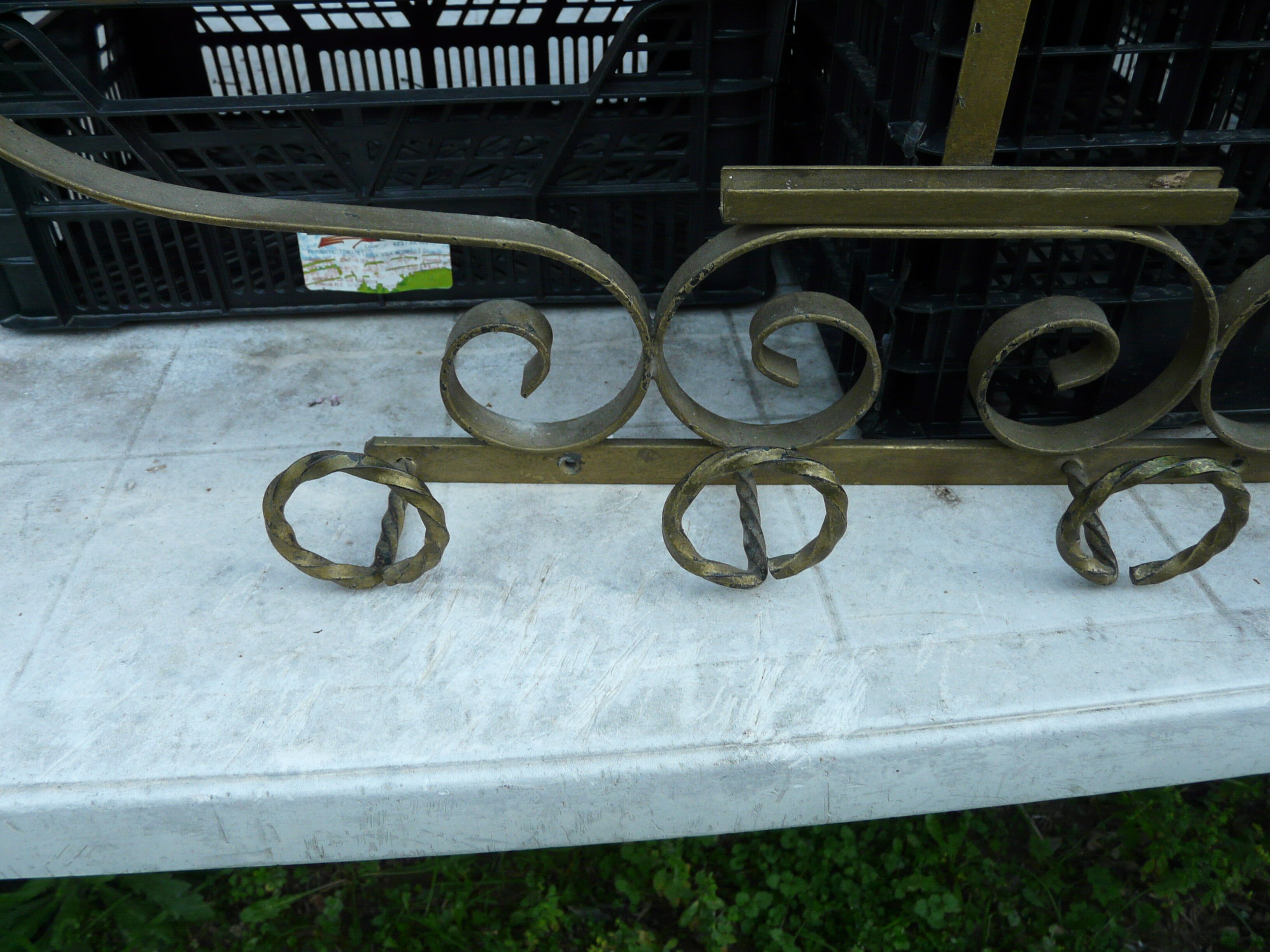Wall mounted wrought iron coat rack from the 1970s