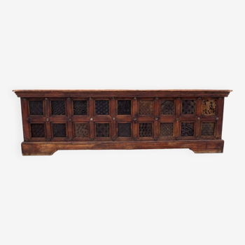 The chest is made of exotic wood.