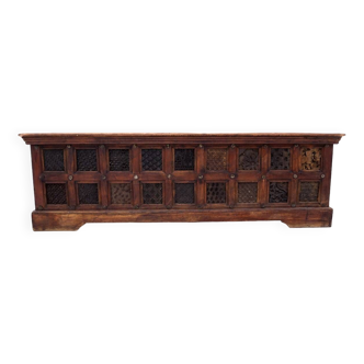 The chest is made of exotic wood.