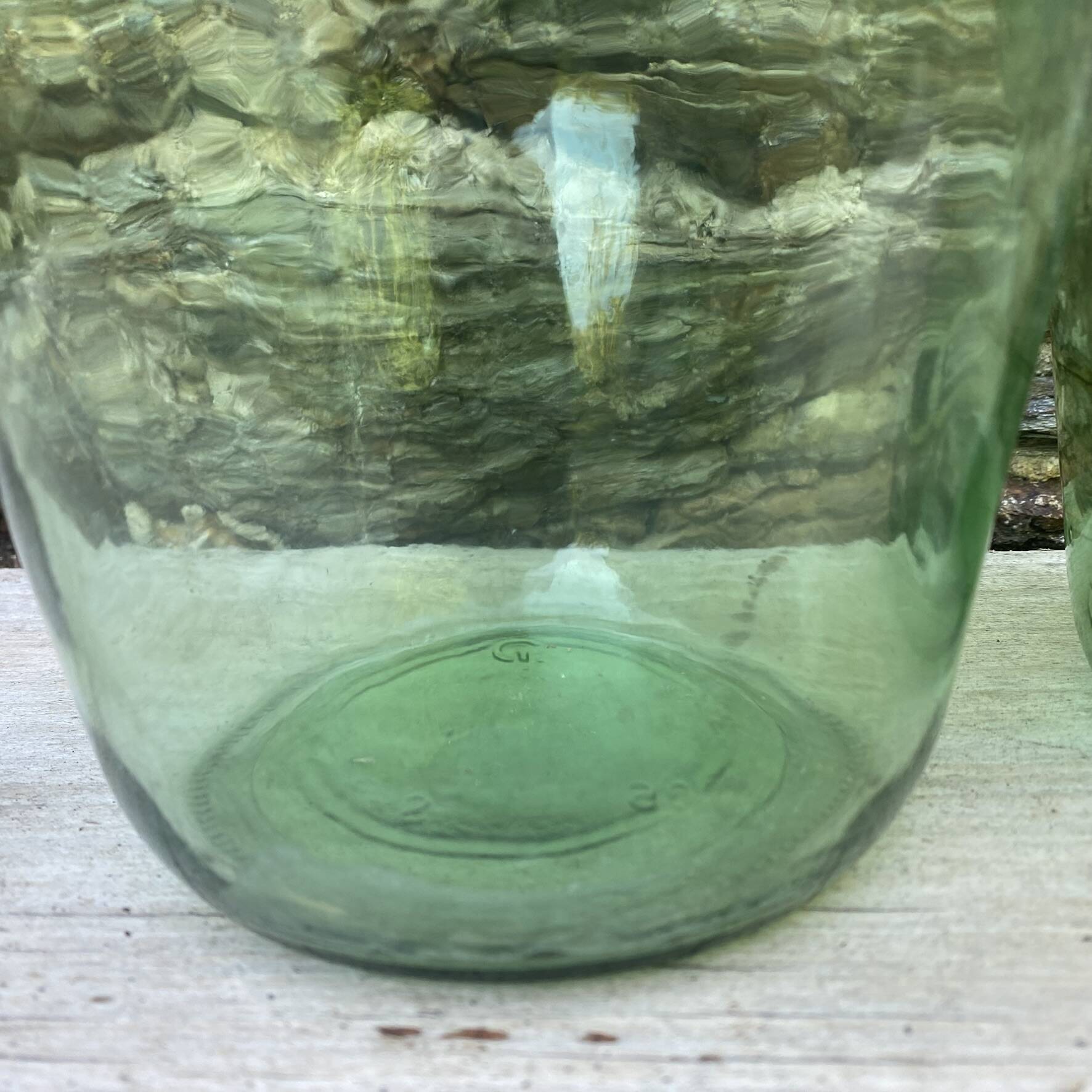 set of tinted glass demijohns