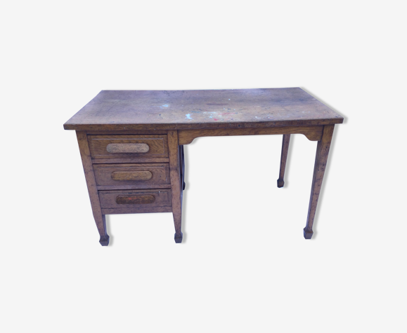 Bureau en bois à trois tiroirs