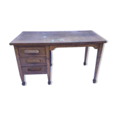 Wooden desk with three drawers