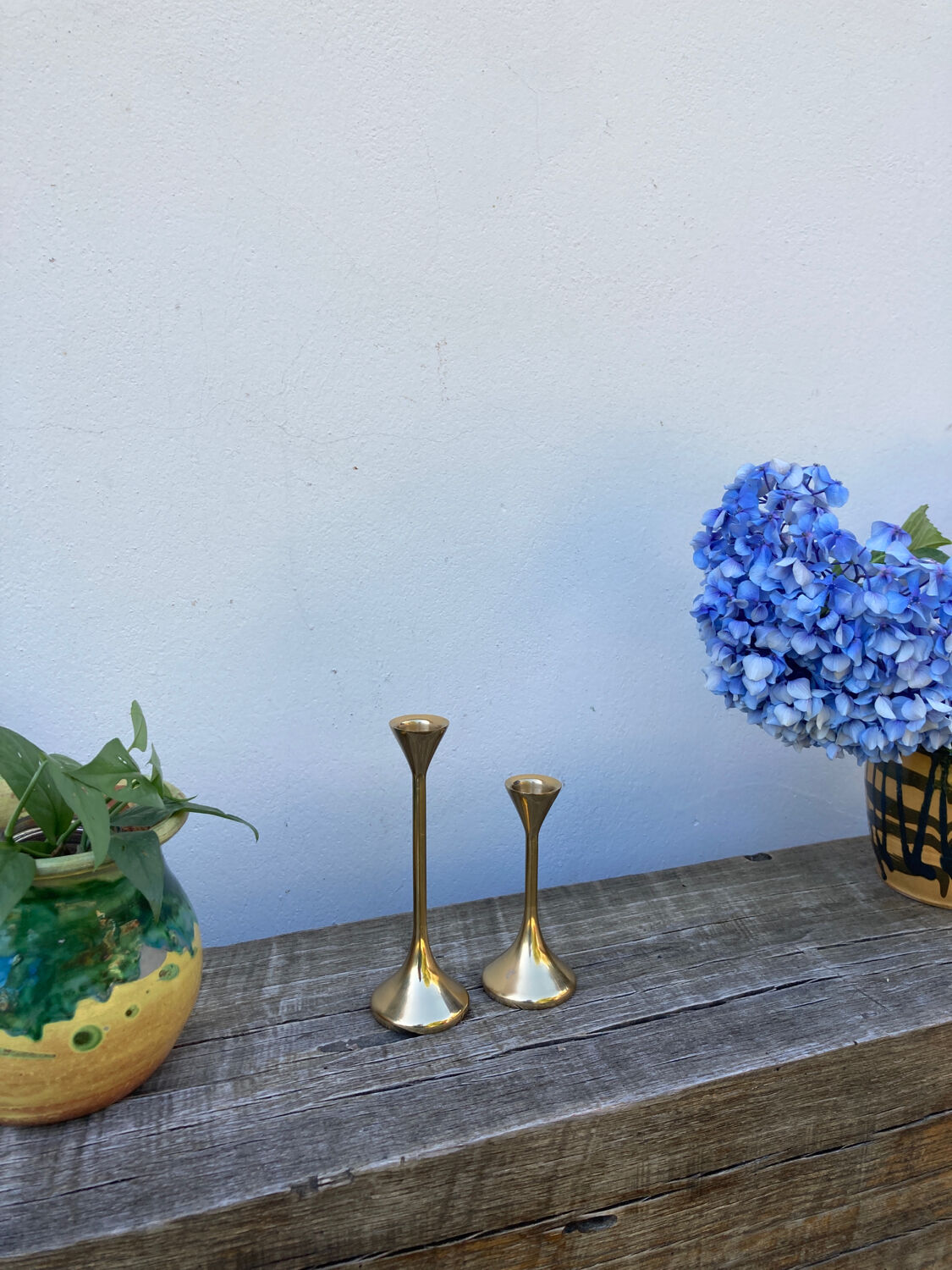 Duo of Scandinavian candle holders in gilded brass