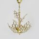 Antique 3-light floral pendant light in gilded metal with glass pendants. 80s