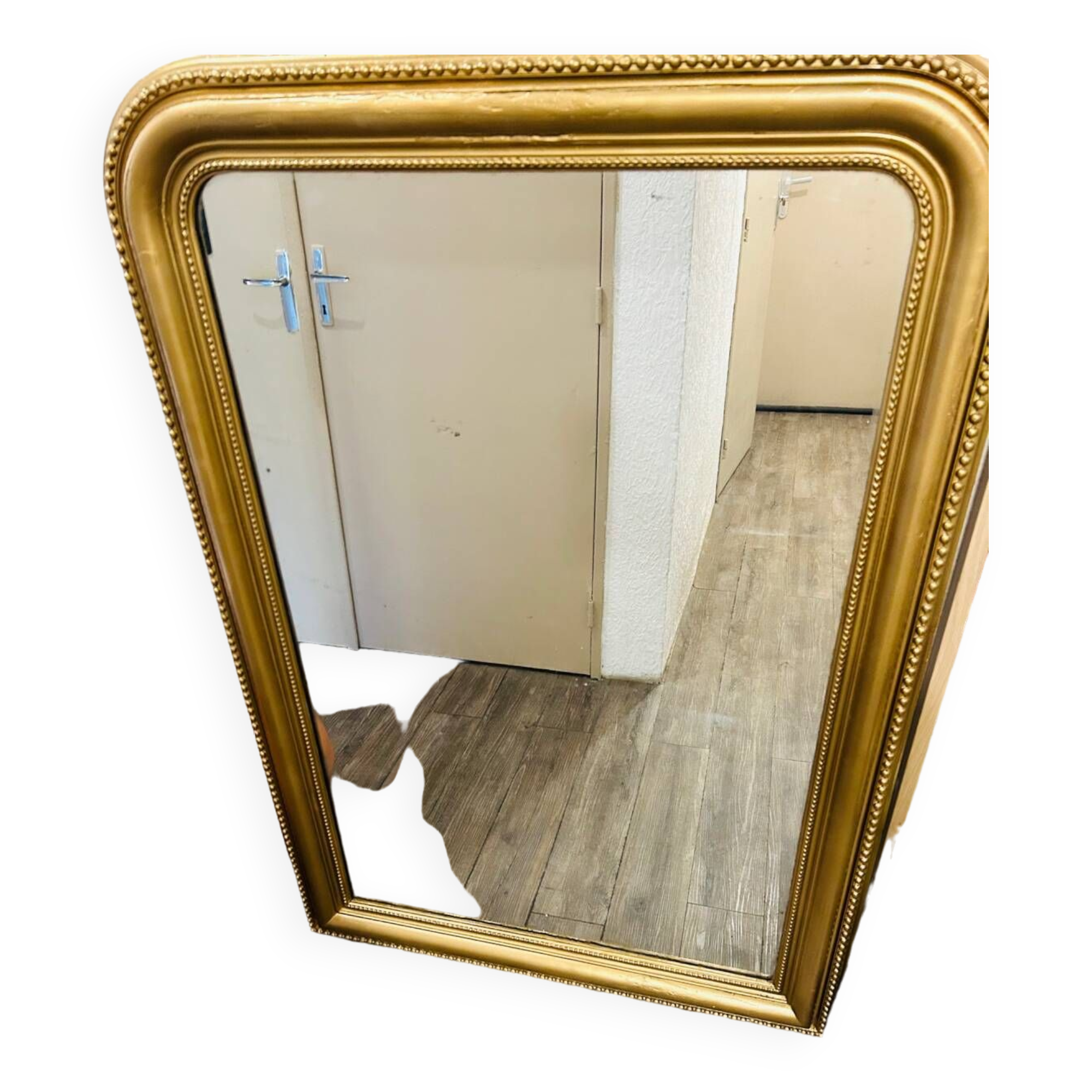 Antique gilded mirror in old Louis Philippe wood