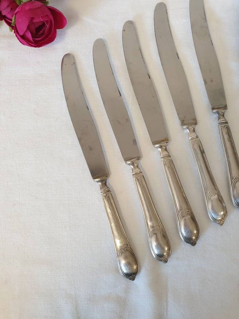 Large antique X6 knives made of silver metal