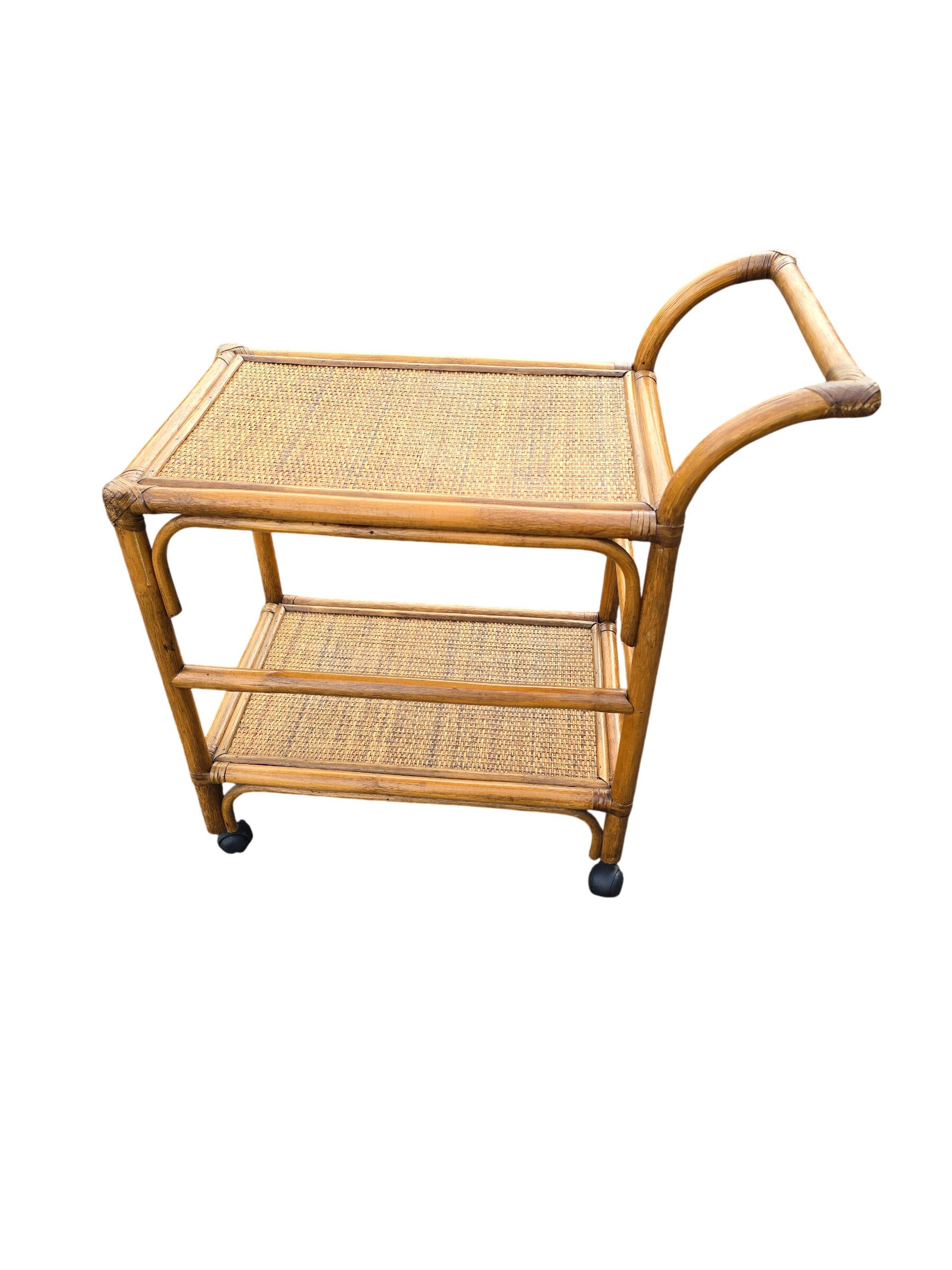 Vintage rolling dessert trolley in rattan and cane from the 60s/70s.