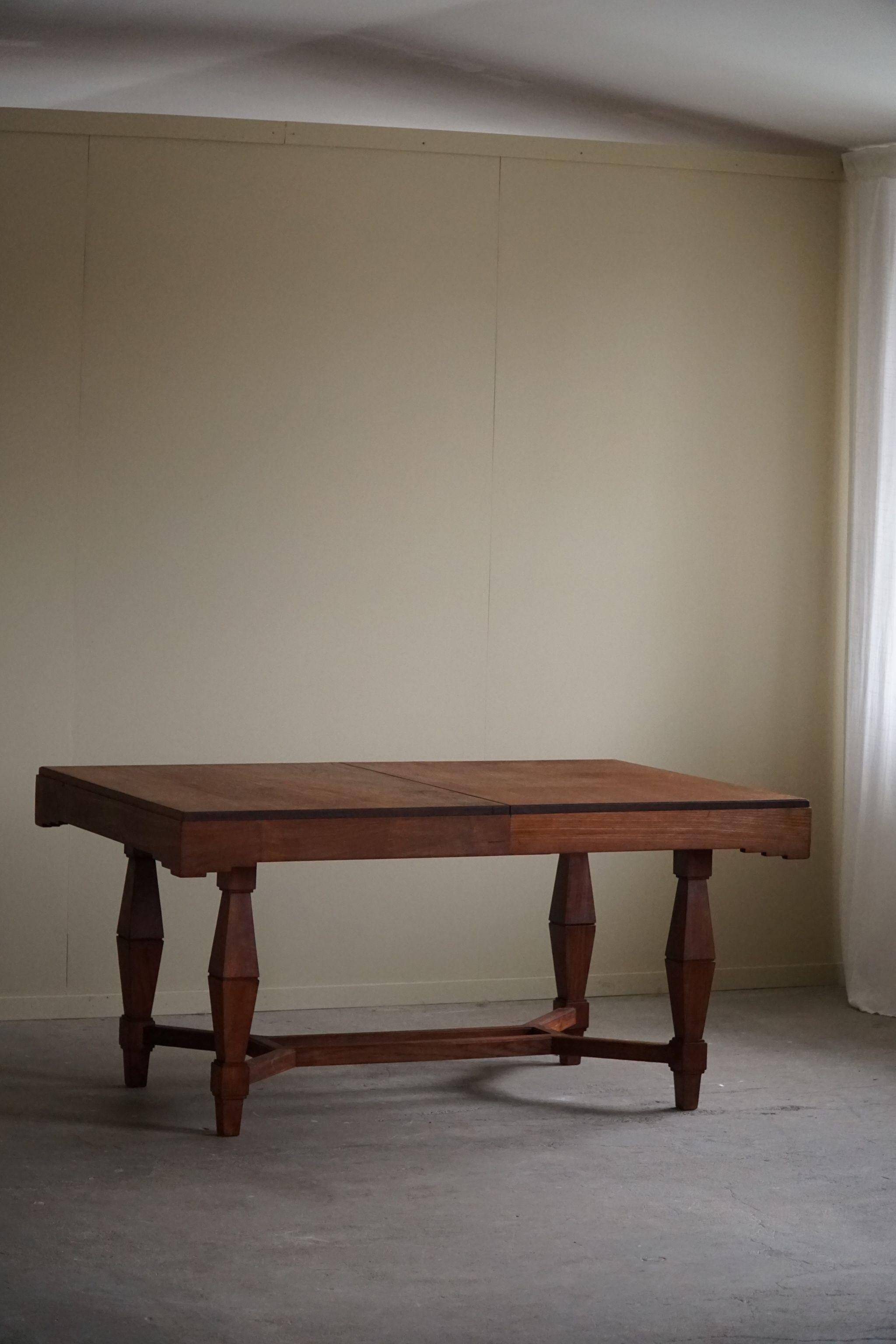 Art Deco dining table in teak, with butterfly extension, Danish cabinetmaker, 1940s.