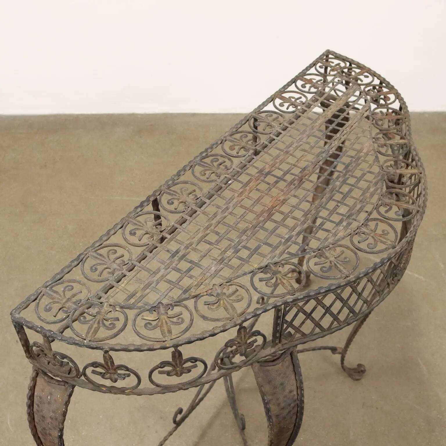 Old iron console painted with tin decorations, 20th century.
