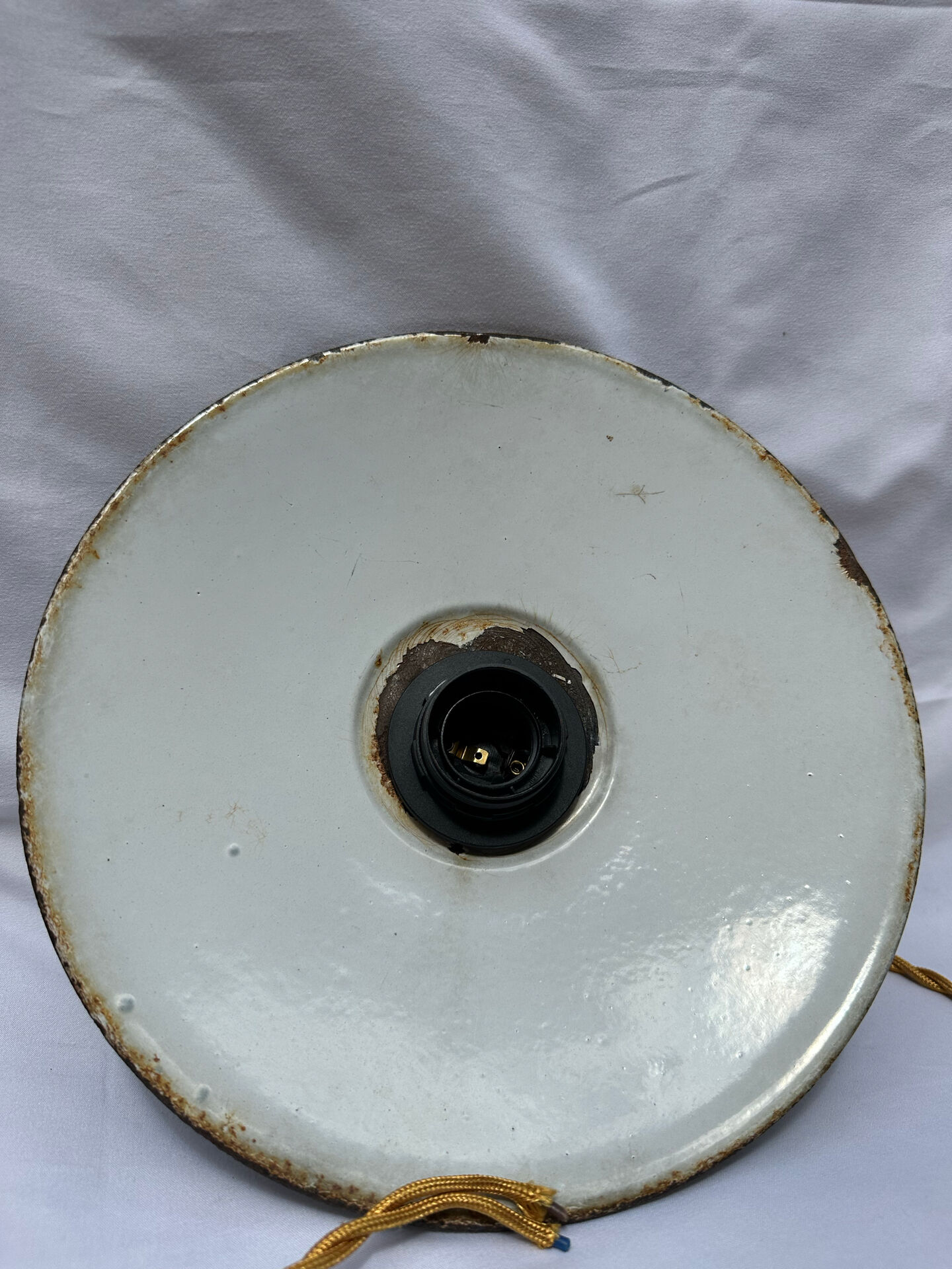 Old green and white enamelled sheet metal suspension