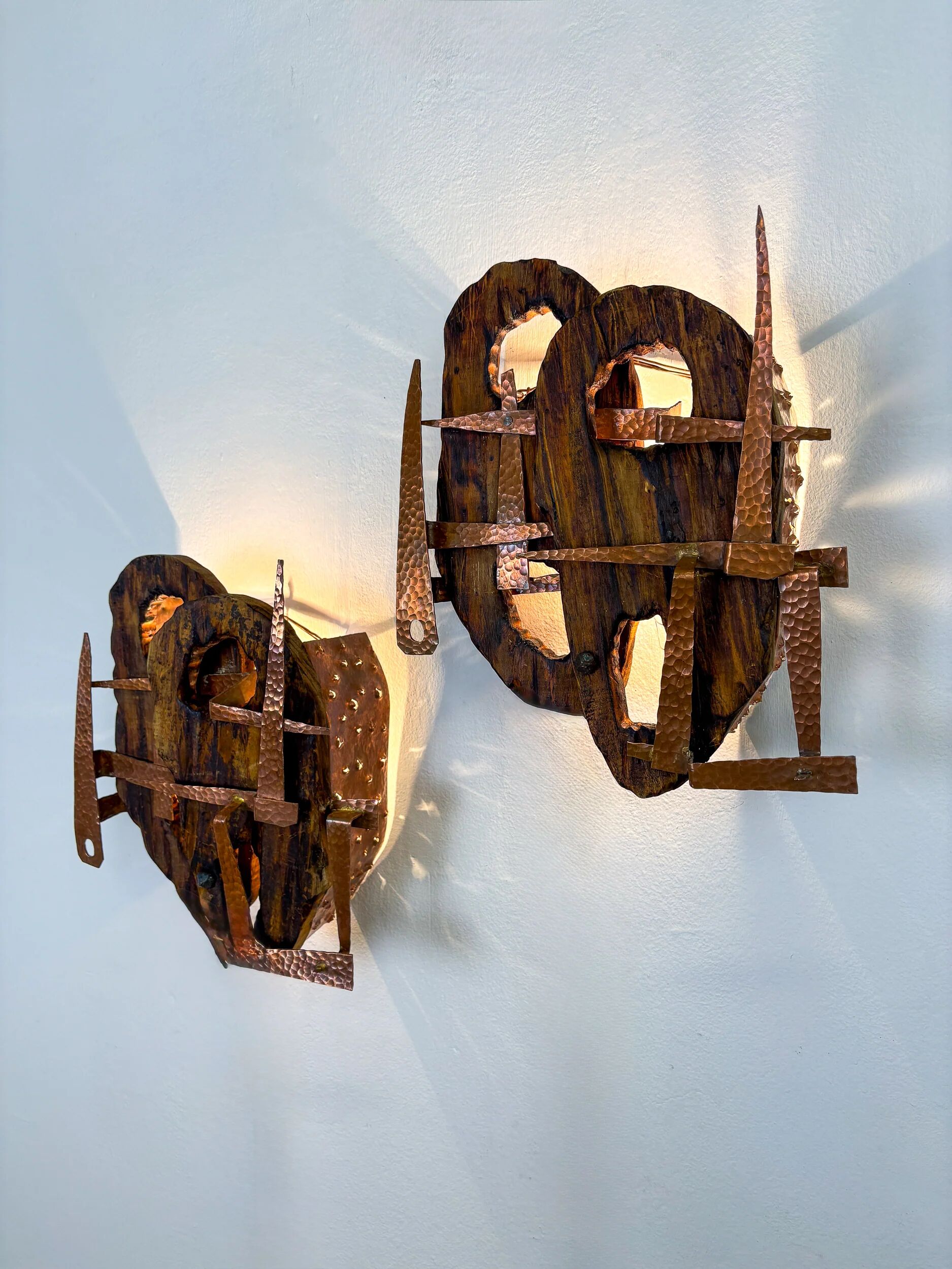 Pair of Brutalist wood & copper wall sconces, Italy, 1970s