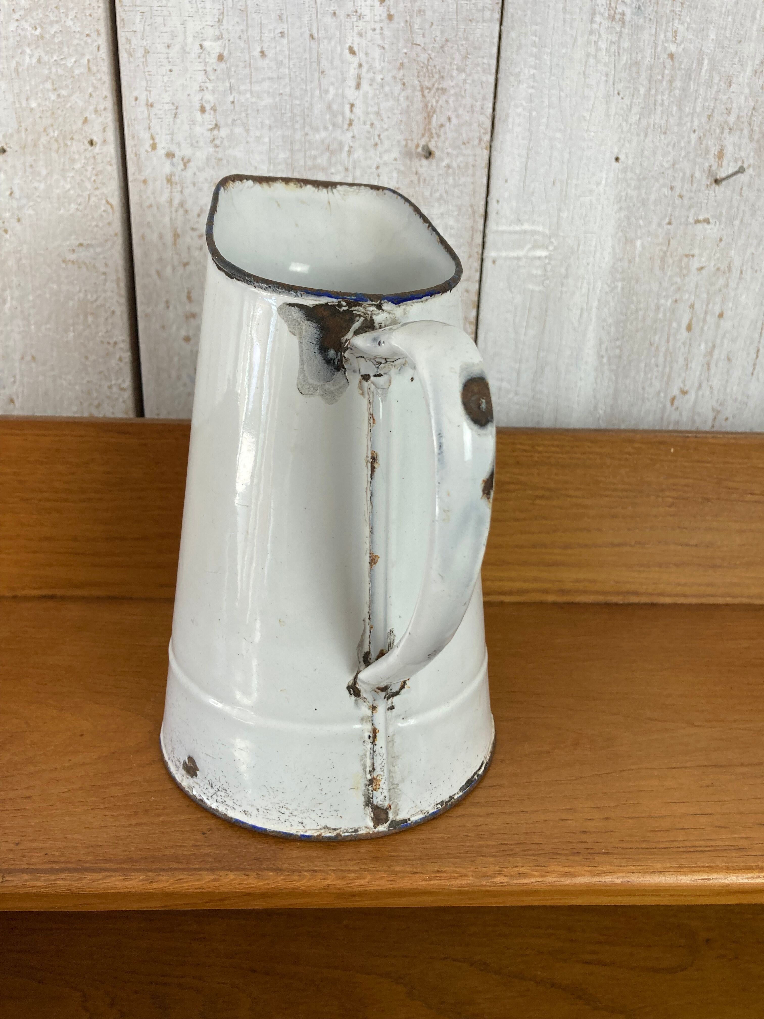 Enamelled pitcher