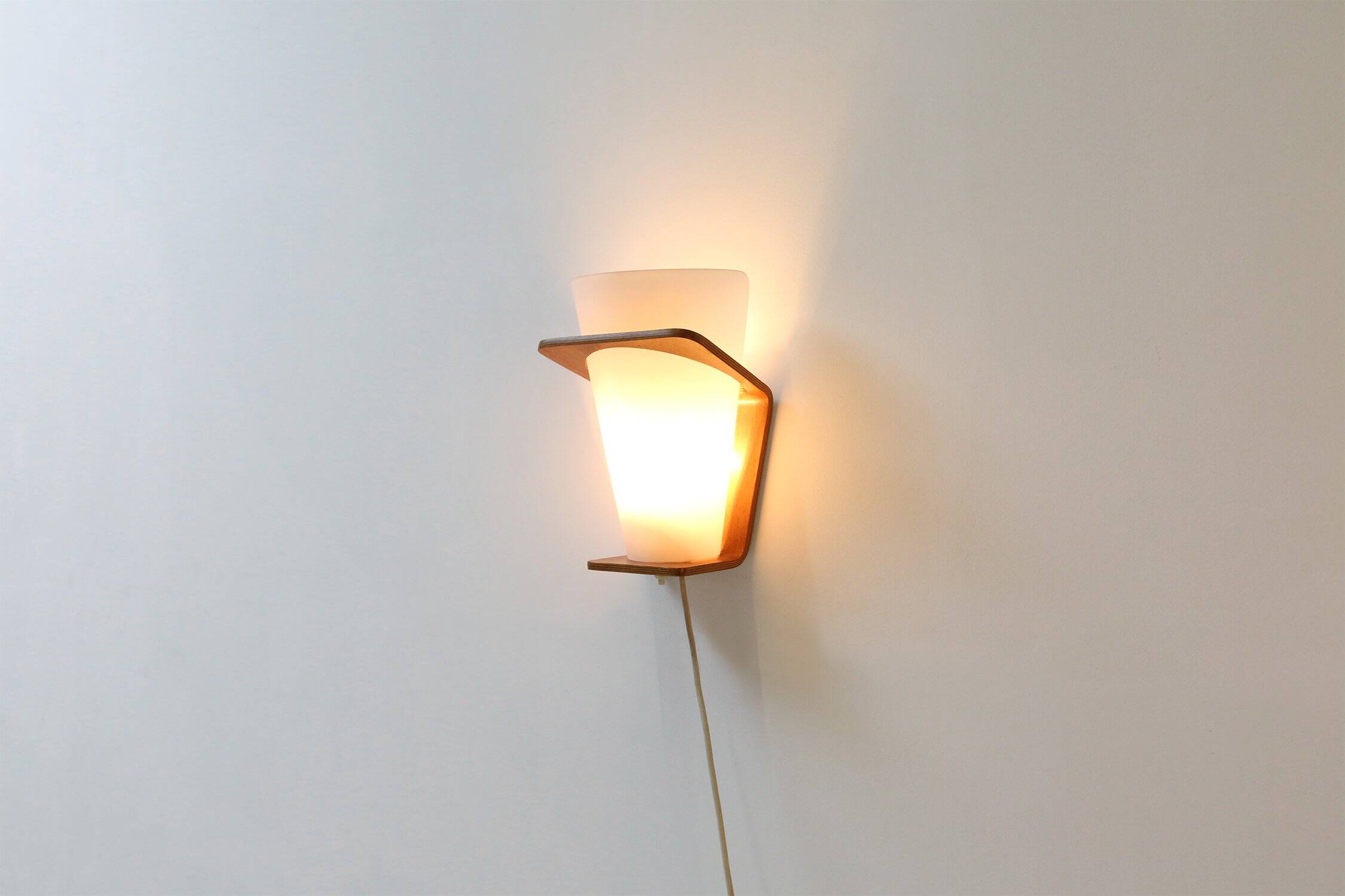 Wall Lamp in Curved Teak Plywood by Louis Kalff for Philips, 1959