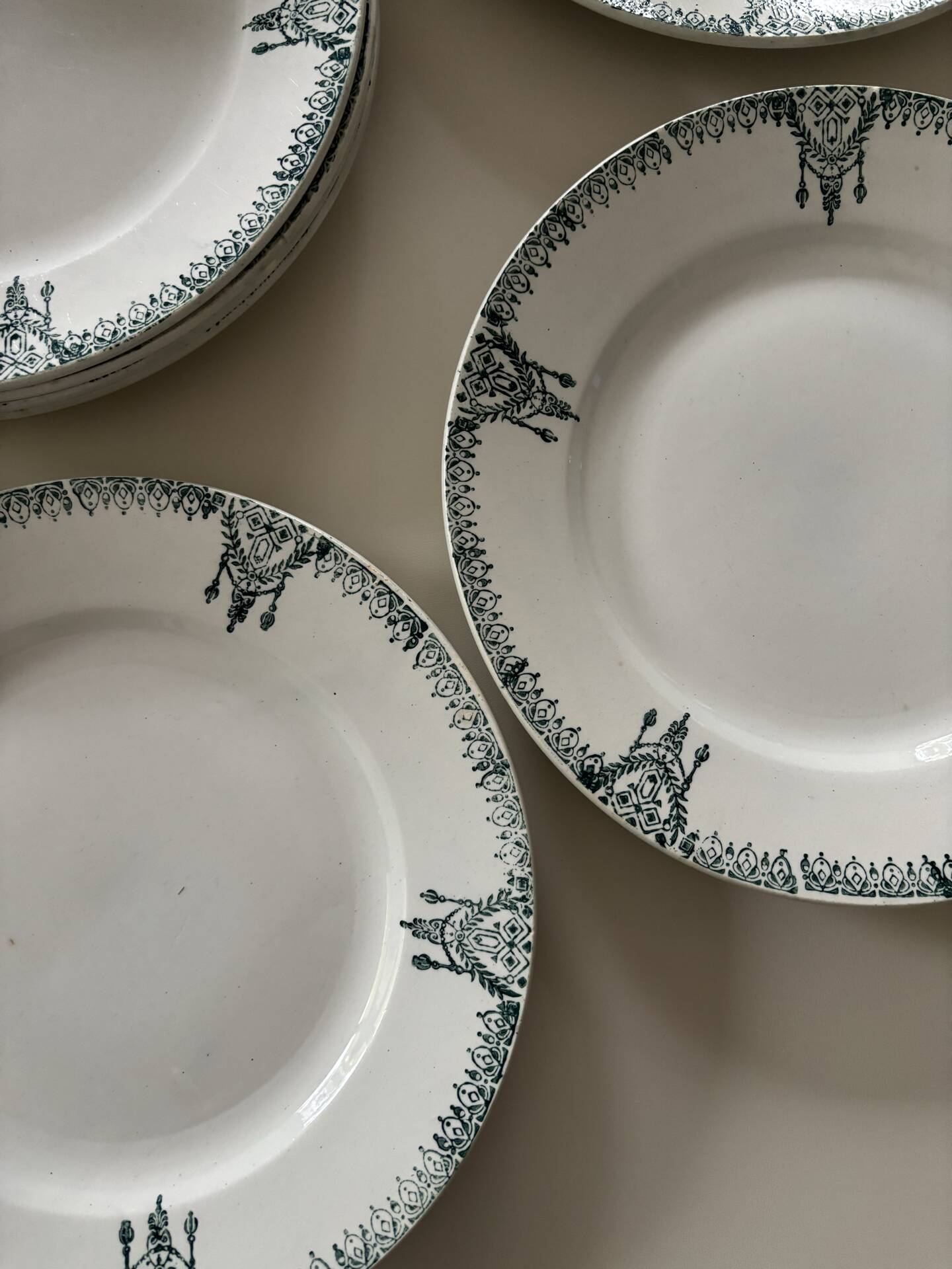Flat plates in antique St Amand earthenware