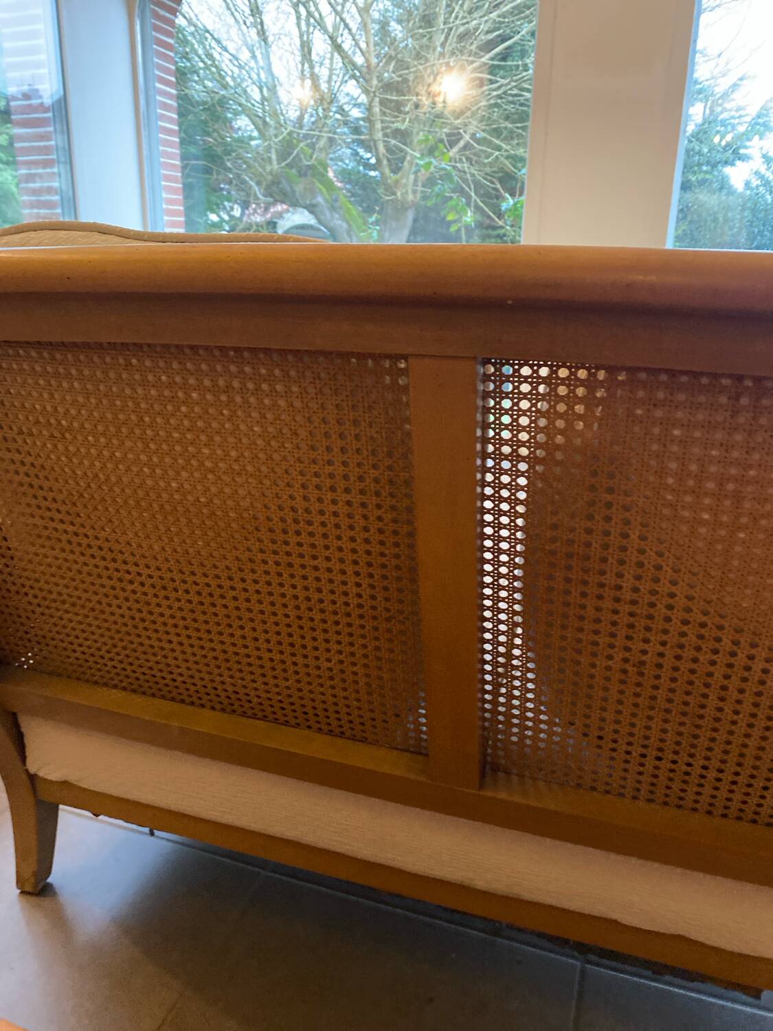 Sofa and armchair in cane and wood by Jean Roche