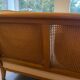 Sofa and armchair in cane and wood by Jean Roche